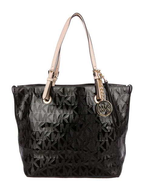 resi michael kors|Michael Kors leather tote.